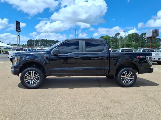 2023 Ford F-150 XL in Agate Black Metal — front three-quarter view