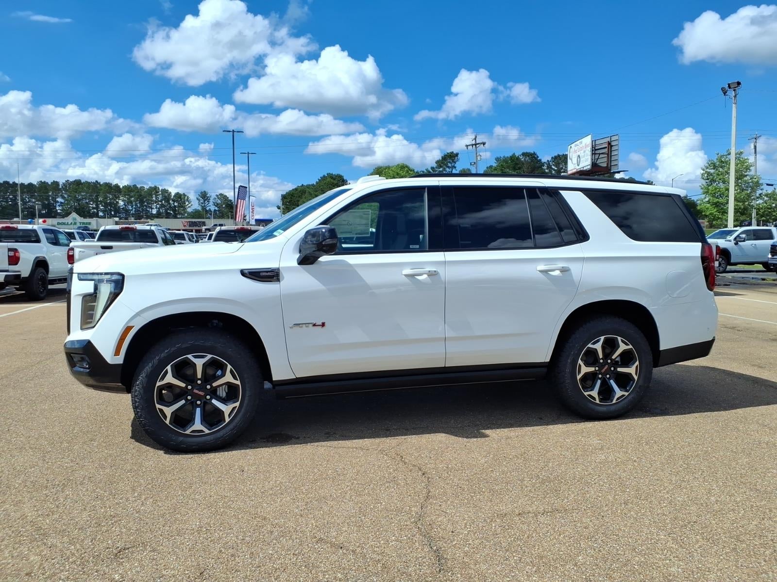 2026 GMC Yukon AT4 in Summit White — front three-quarter view
