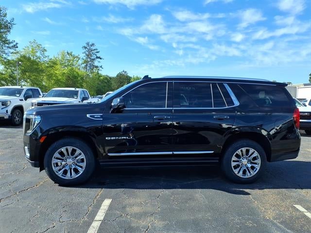2021 GMC Yukon Denali in Onyx Black — front three-quarter view