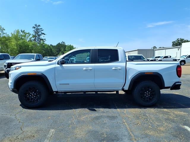 2026 GMC Canyon Elevation in Summit White — front three-quarter view