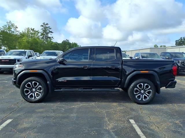 2023 GMC Canyon AT4 in Onyx Black — front three-quarter view