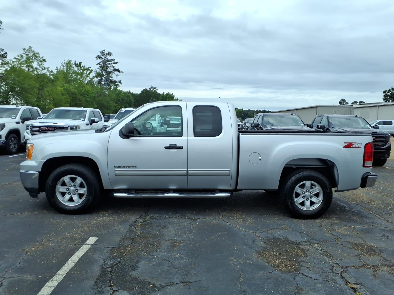 2012 GMC Sierra 1500 SLE in Quicksilver Metallic — front three-quarter view