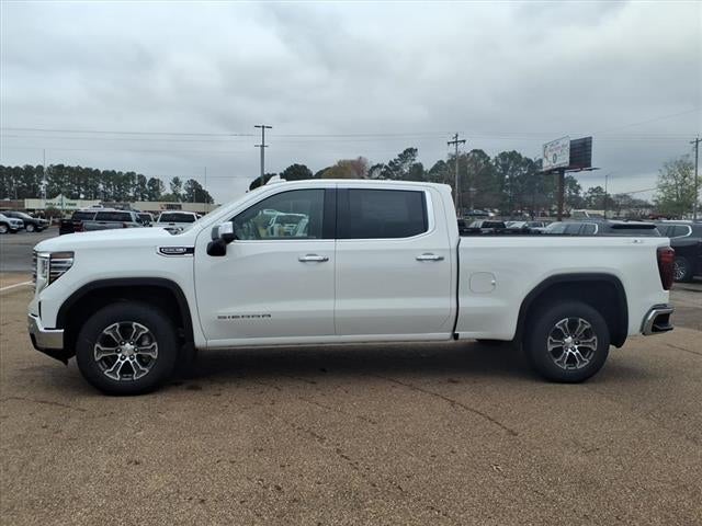 2026 GMC Sierra 1500 SLT in Summit White — front three-quarter view