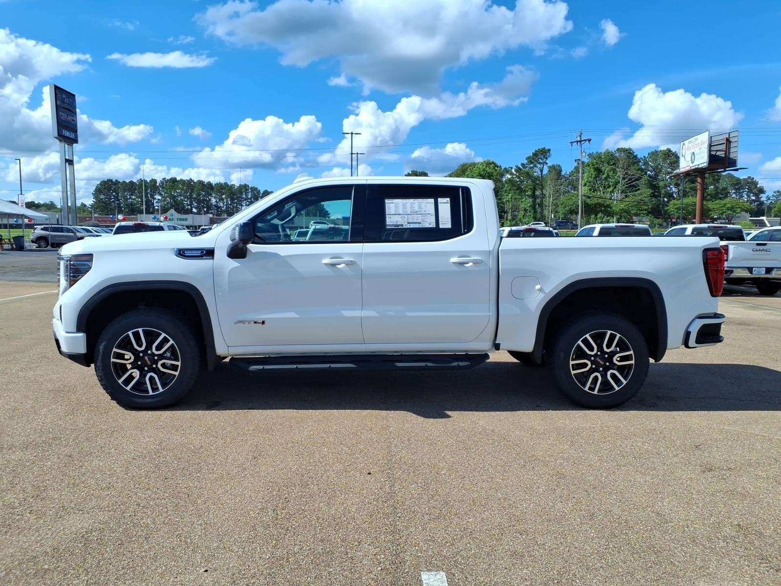 2026 GMC Sierra 1500 AT4 in Summit White — front three-quarter view