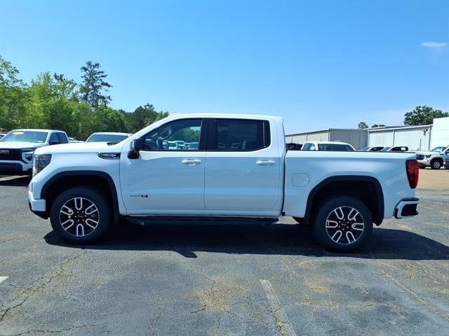 2026 GMC Sierra 1500 AT4 in Summit White — front three-quarter view