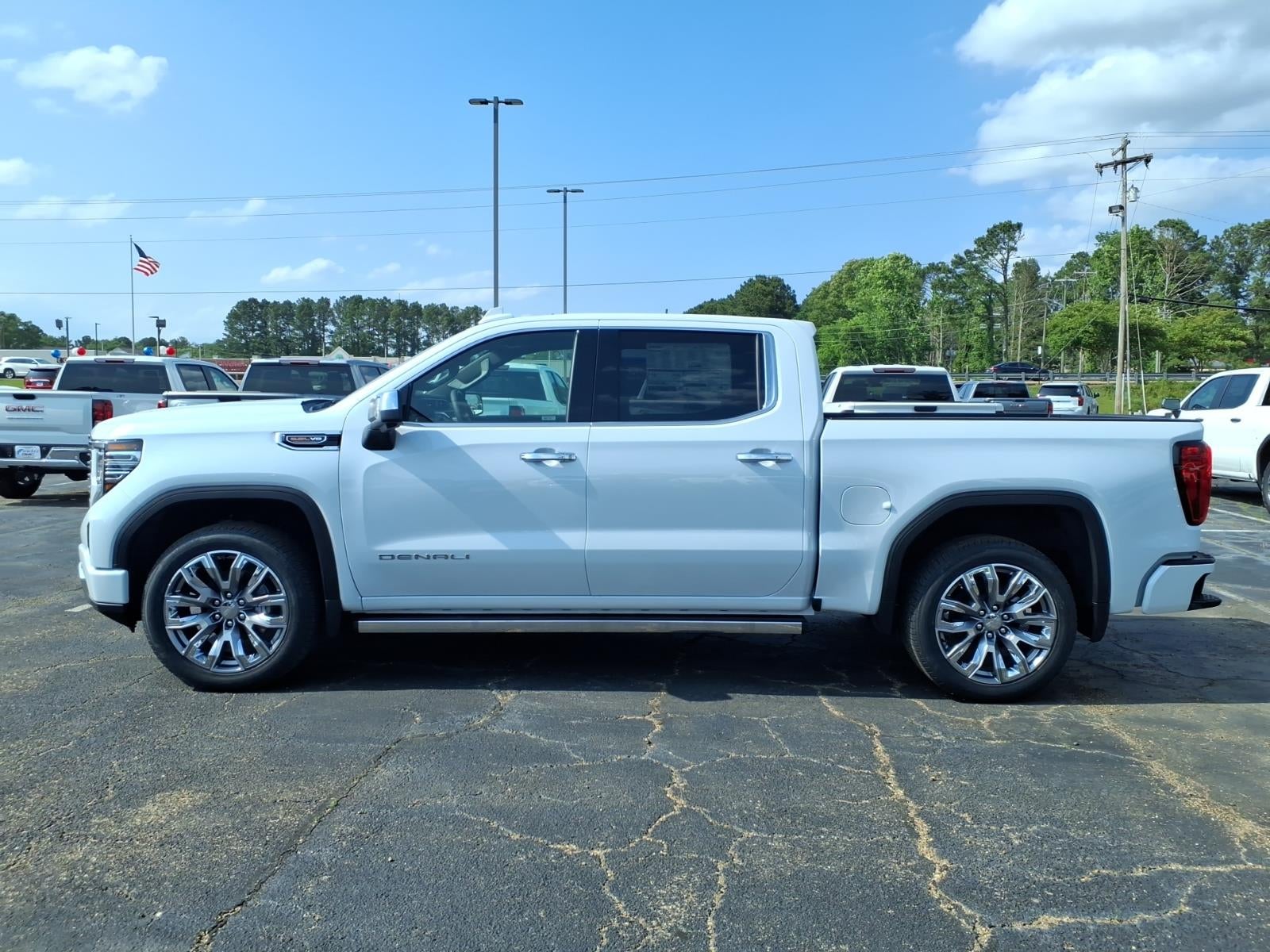 2026 GMC Sierra 1500 Denali in Glacier White Tricoat — front three-quarter view