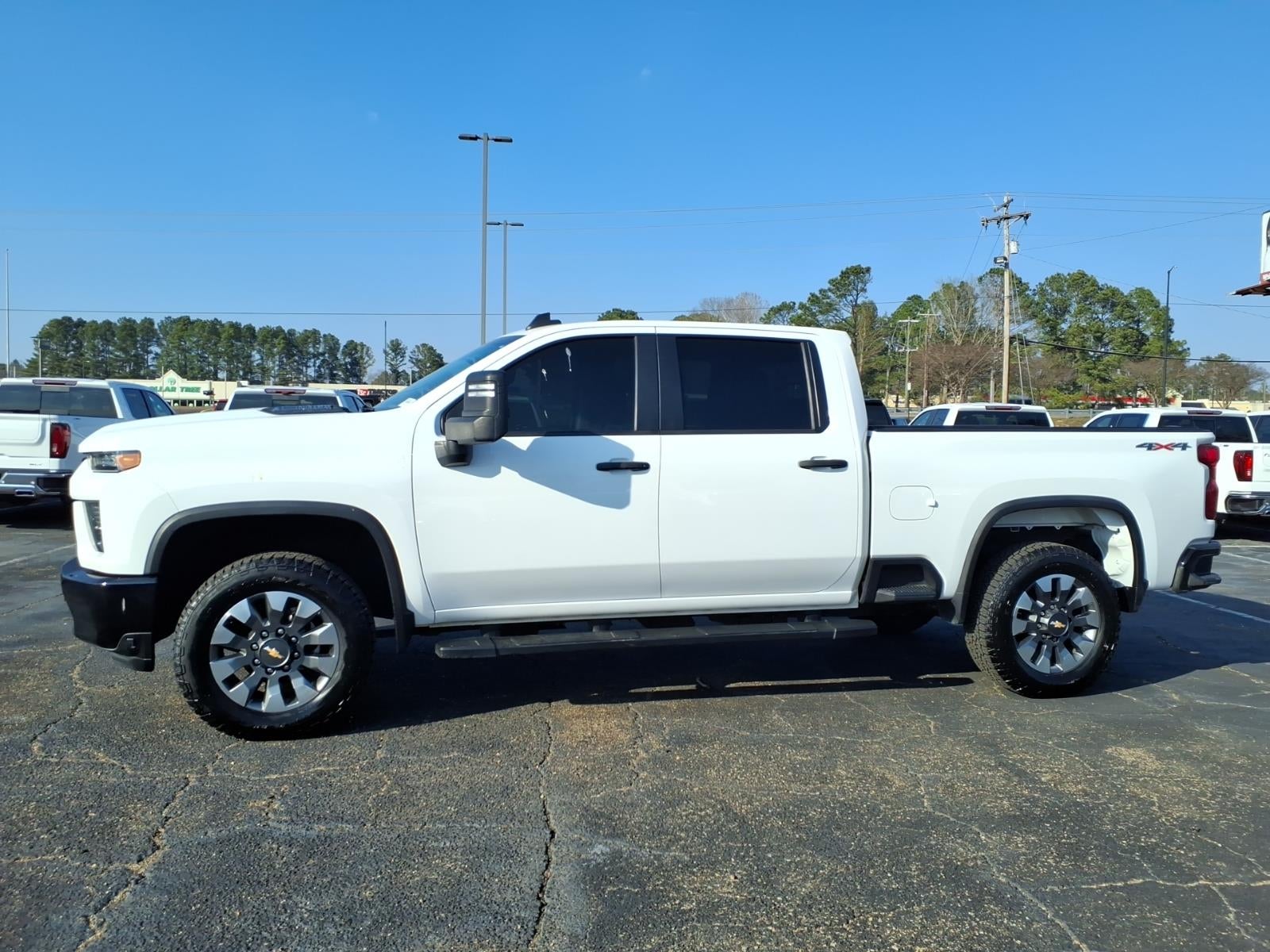 2022 Chevrolet Silverado 2500 HD Custom in Summit White — front three-quarter view