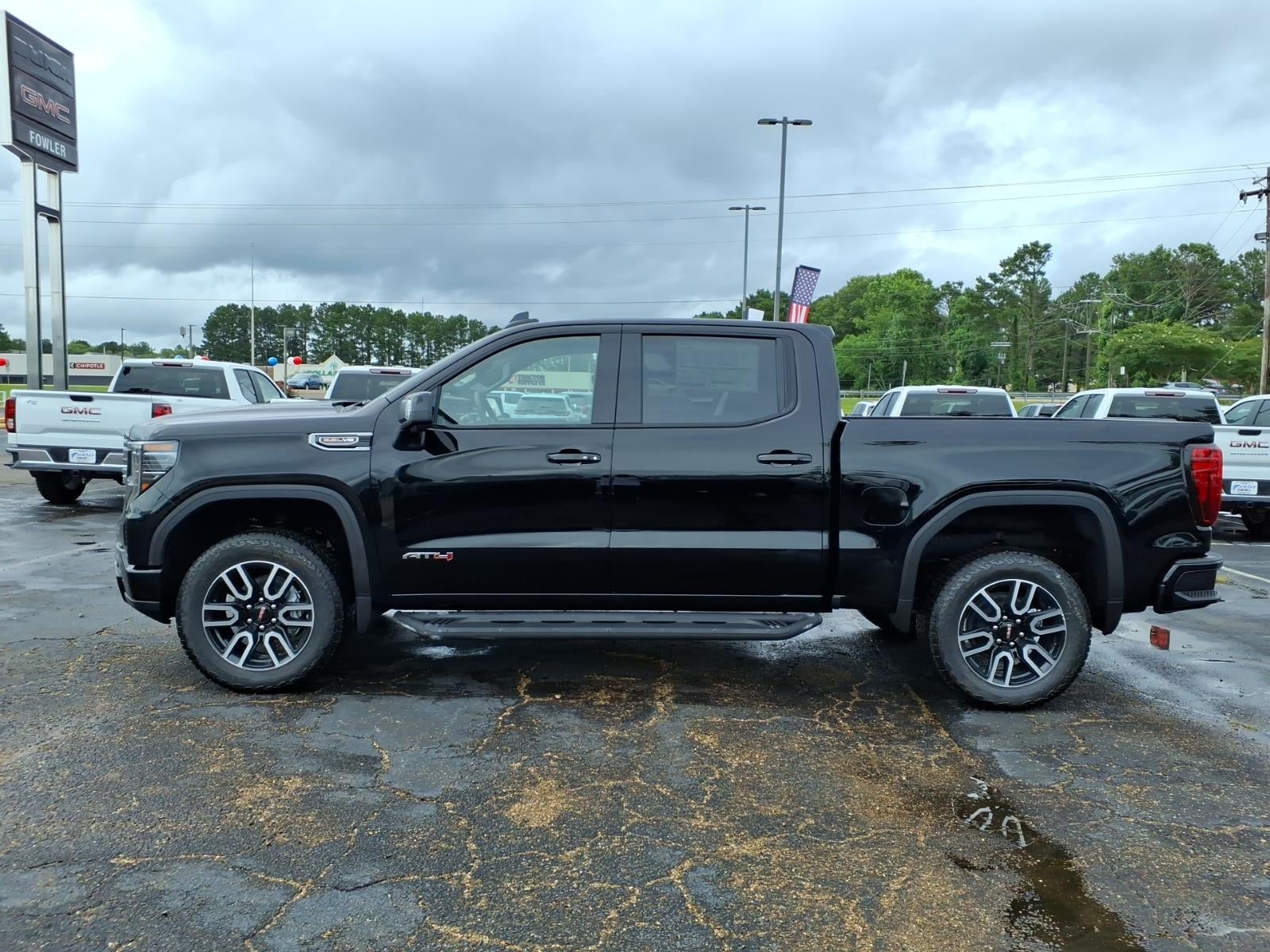 2026 GMC Sierra 1500 AT4 in Onyx Black — front three-quarter view