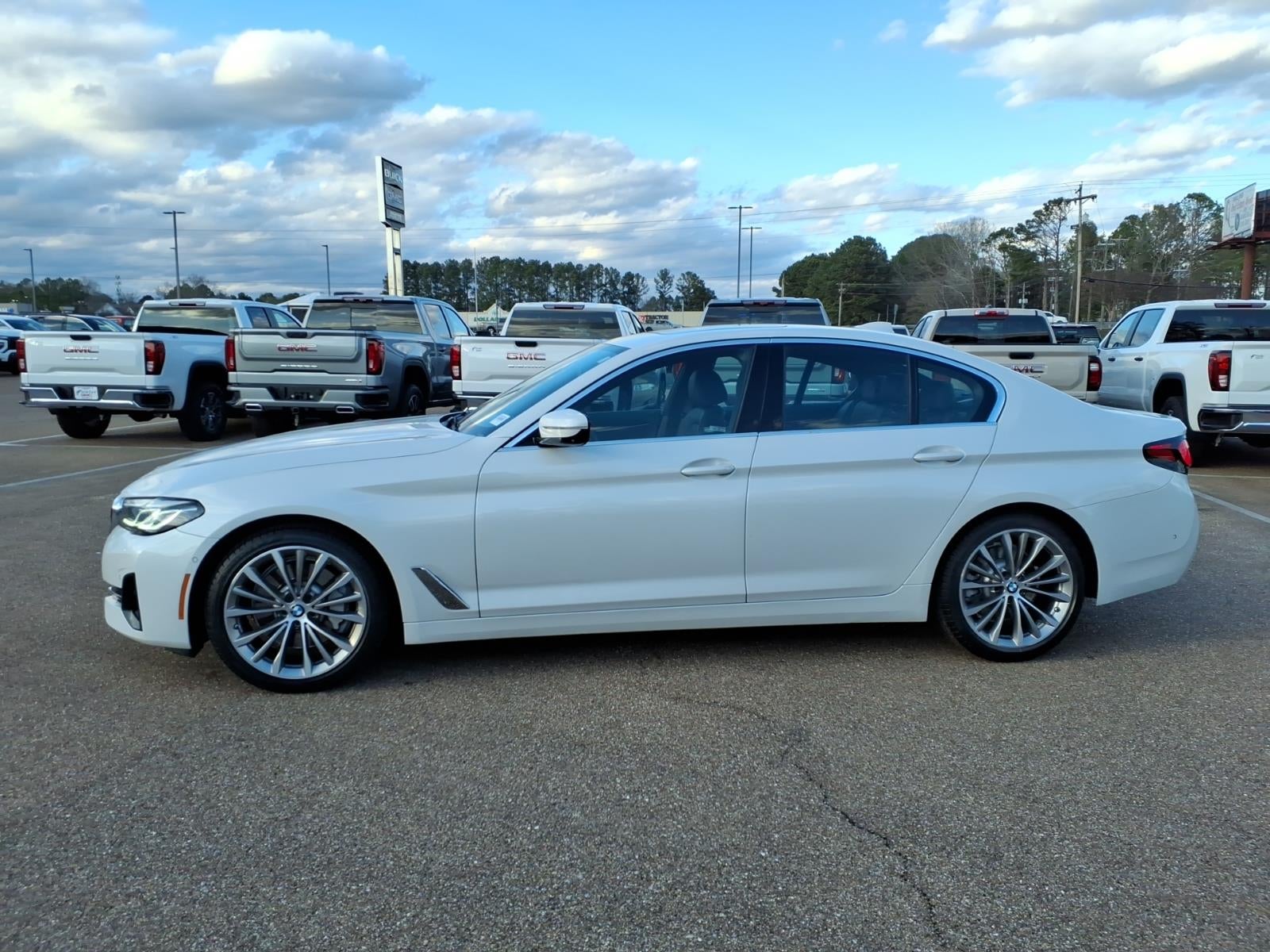 2021 BMW 5 Series 530i in White — front three-quarter view